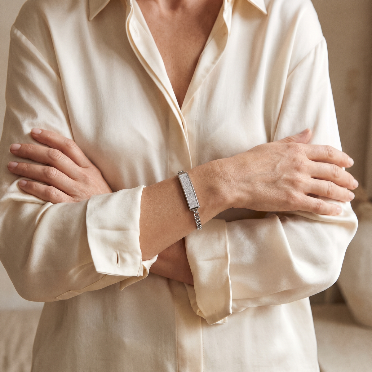 Woman wearing the VitalVibe Bracelet in Crystal Silver